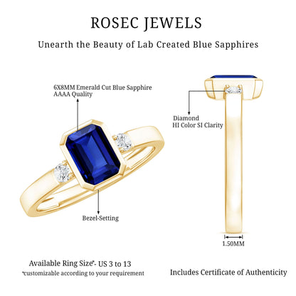 Bezel Set 1.75 Carat Lab Grown Blue Sapphire Emerald Cut Engagement Ring with Diamond