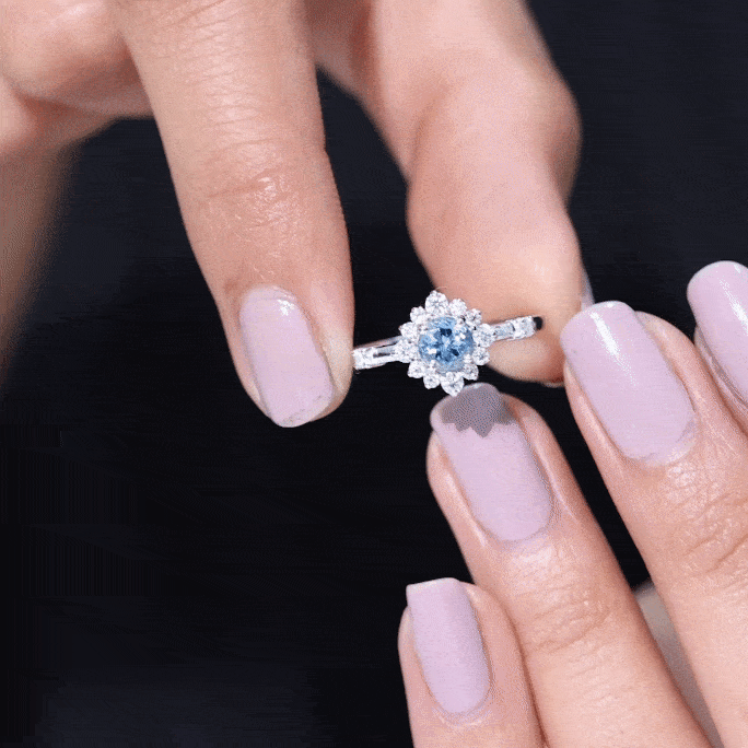 Genuine 0.8 Carat Aquamarine and Diamond Halo Engagement Ring