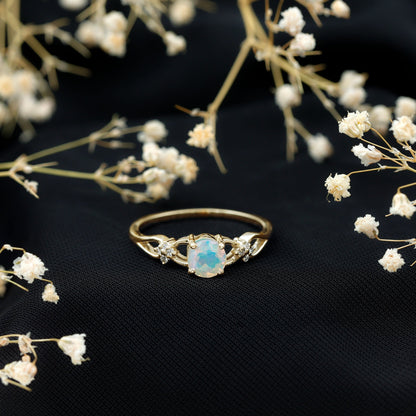 Natural Ethiopian Opal Crossover Engagement Ring with Floral Diamond
