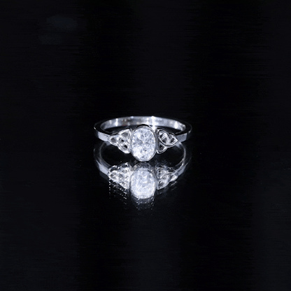 Oval Moissanite Solitaire Celtic Knot Ring in Bezel Setting