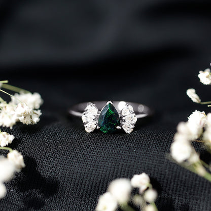 Pear Cut Black Opal Solitaire Engagement Ring with Diamond Trio