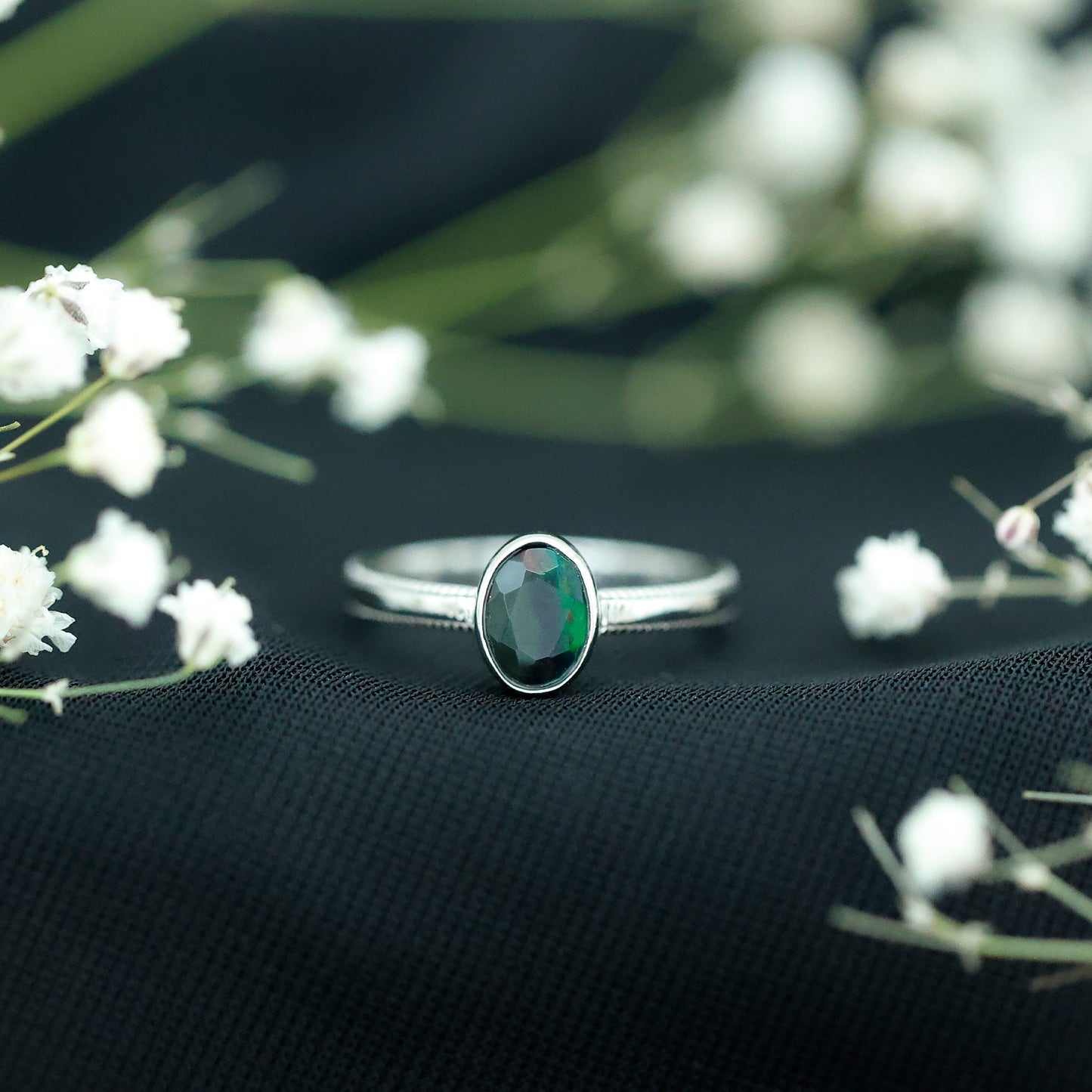 Oval Cut 0.9 Carat Black Opal Bezel Set Engagement Ring