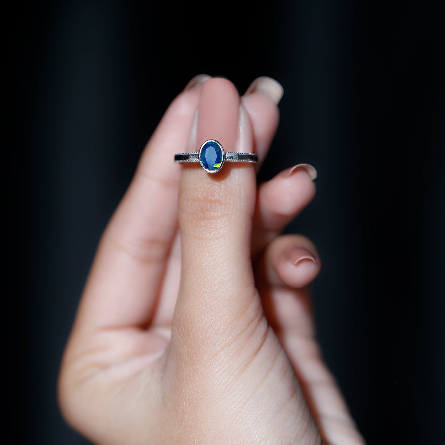 Oval Cut 0.9 Carat Black Opal Bezel Set Engagement Ring