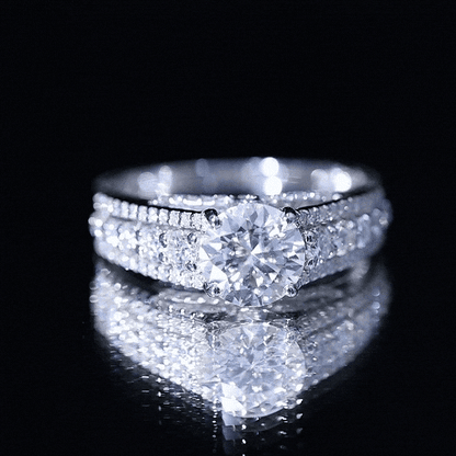 Round Brilliant Cut Moissanite Side Stone Engagement Ring