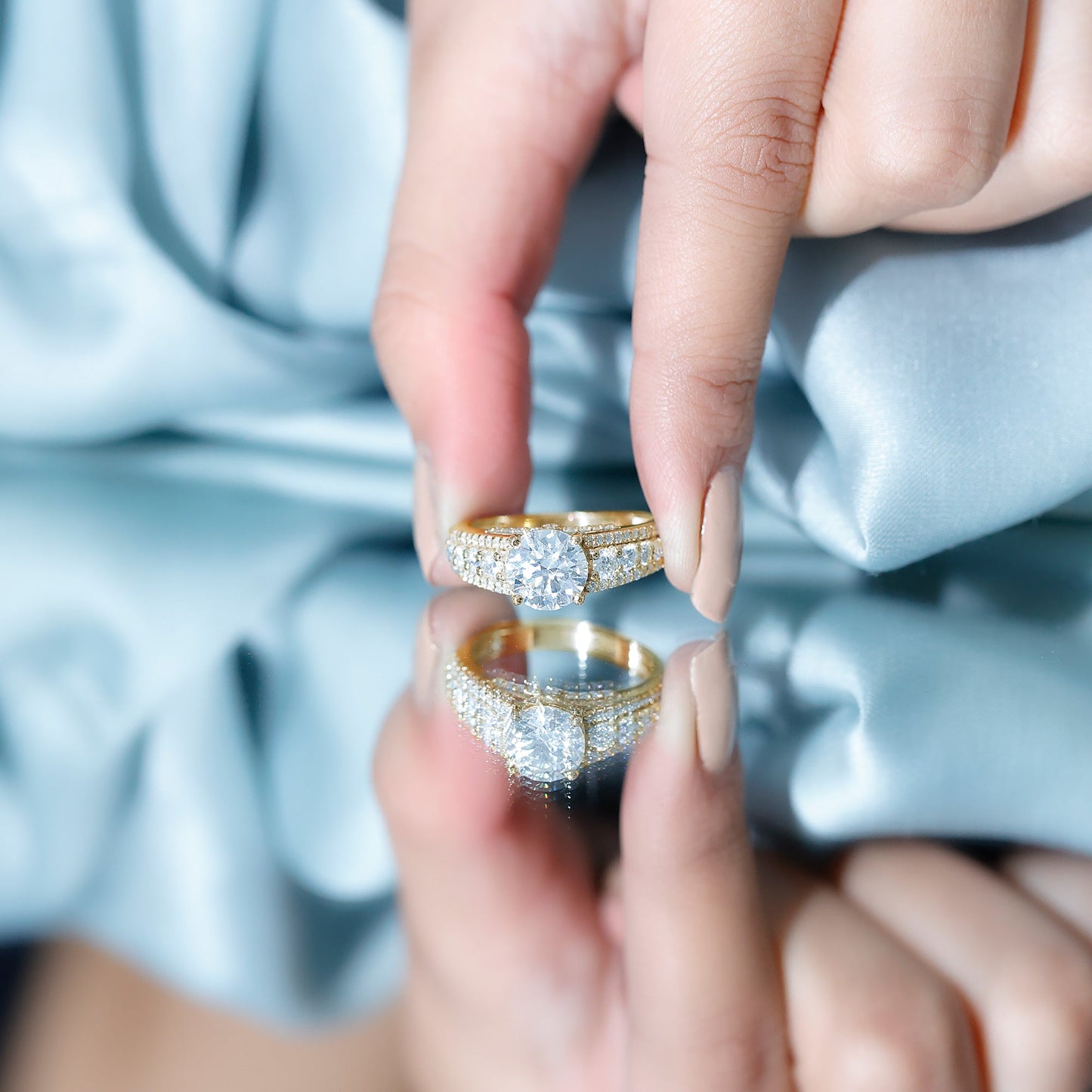 Round Brilliant Cut Moissanite Side Stone Engagement Ring