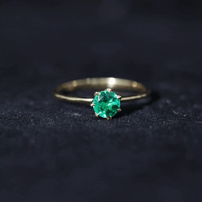 0.8 Carat Round Lab Grown Emerald Solitaire Ring in Lotus Basket Setting