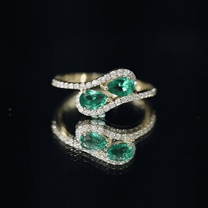 Pear Shape Created Emerald and Diamond Bypass Engagement Ring