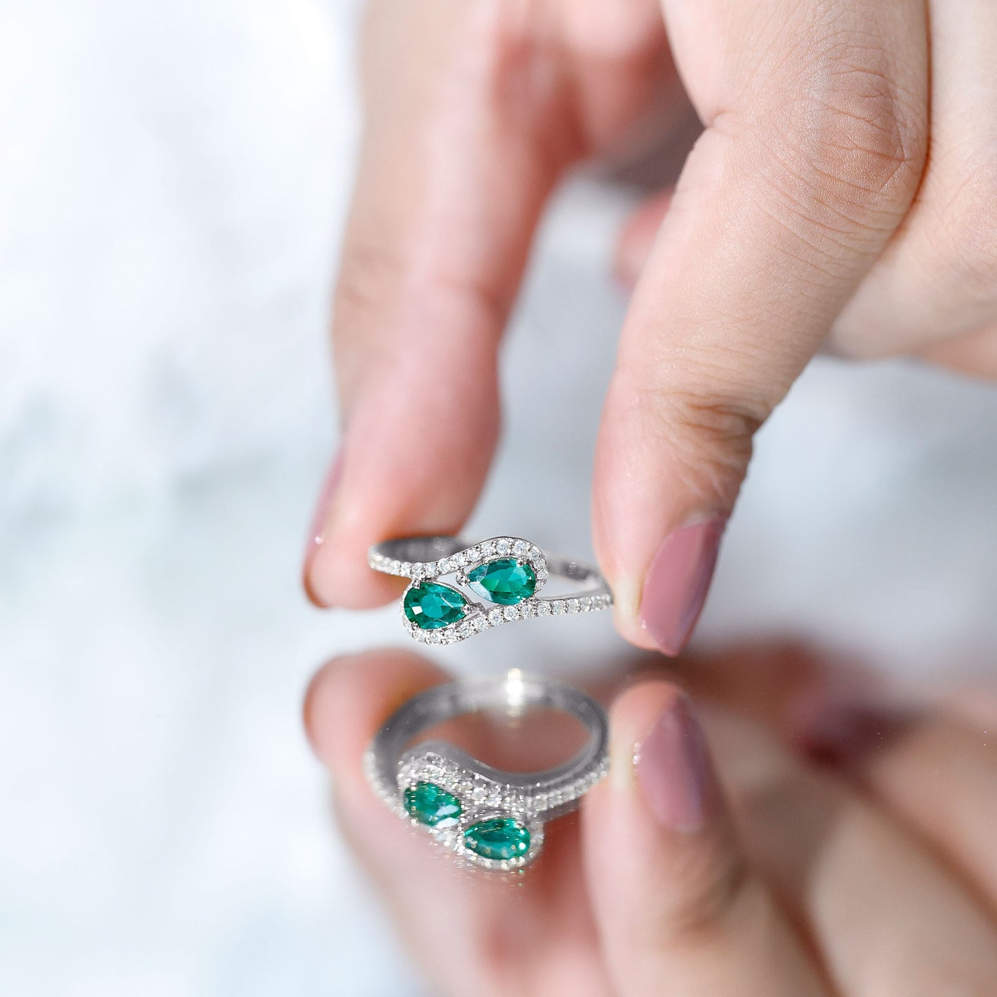 Pear Shape Created Emerald and Diamond Bypass Engagement Ring