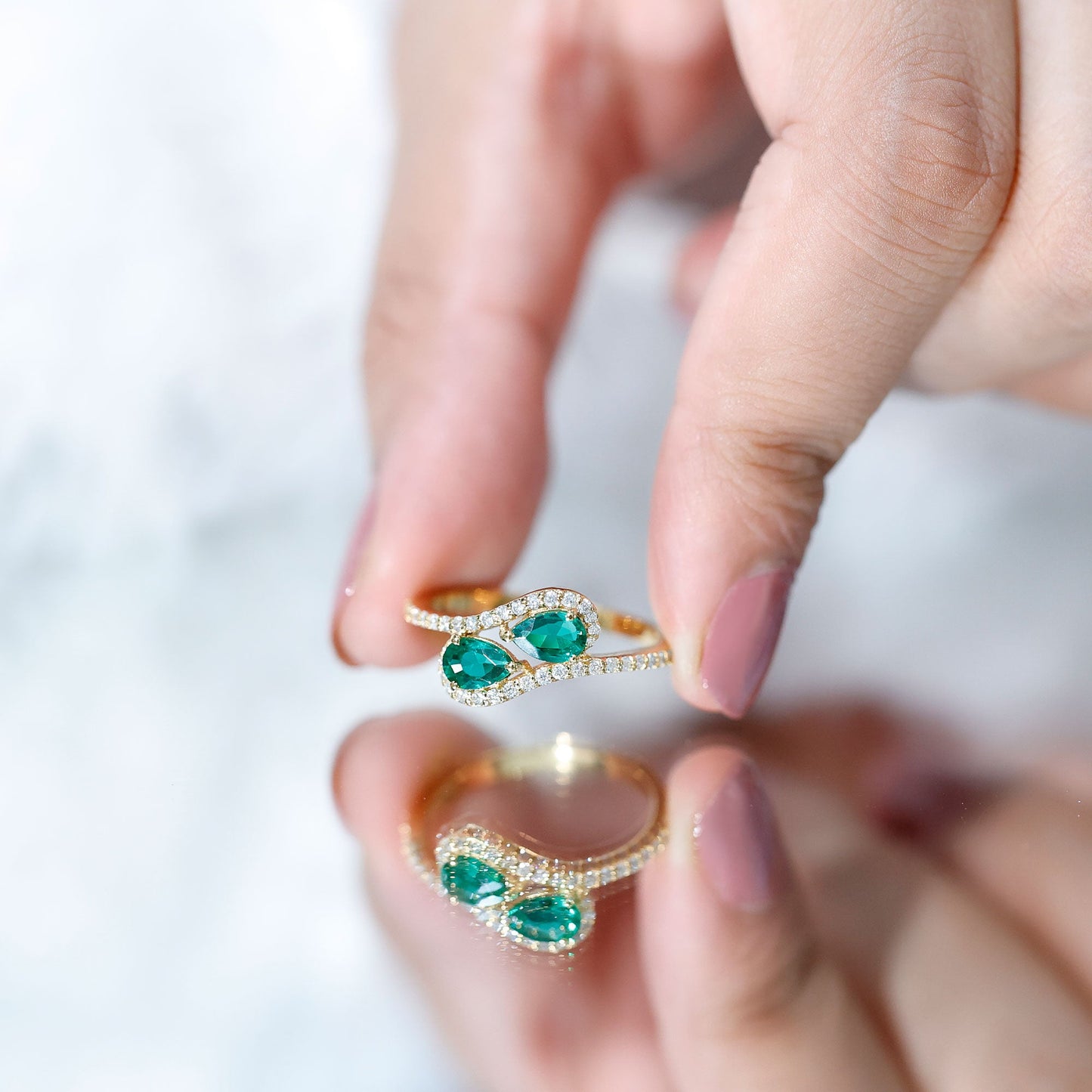 Pear Shape Created Emerald and Diamond Bypass Engagement Ring