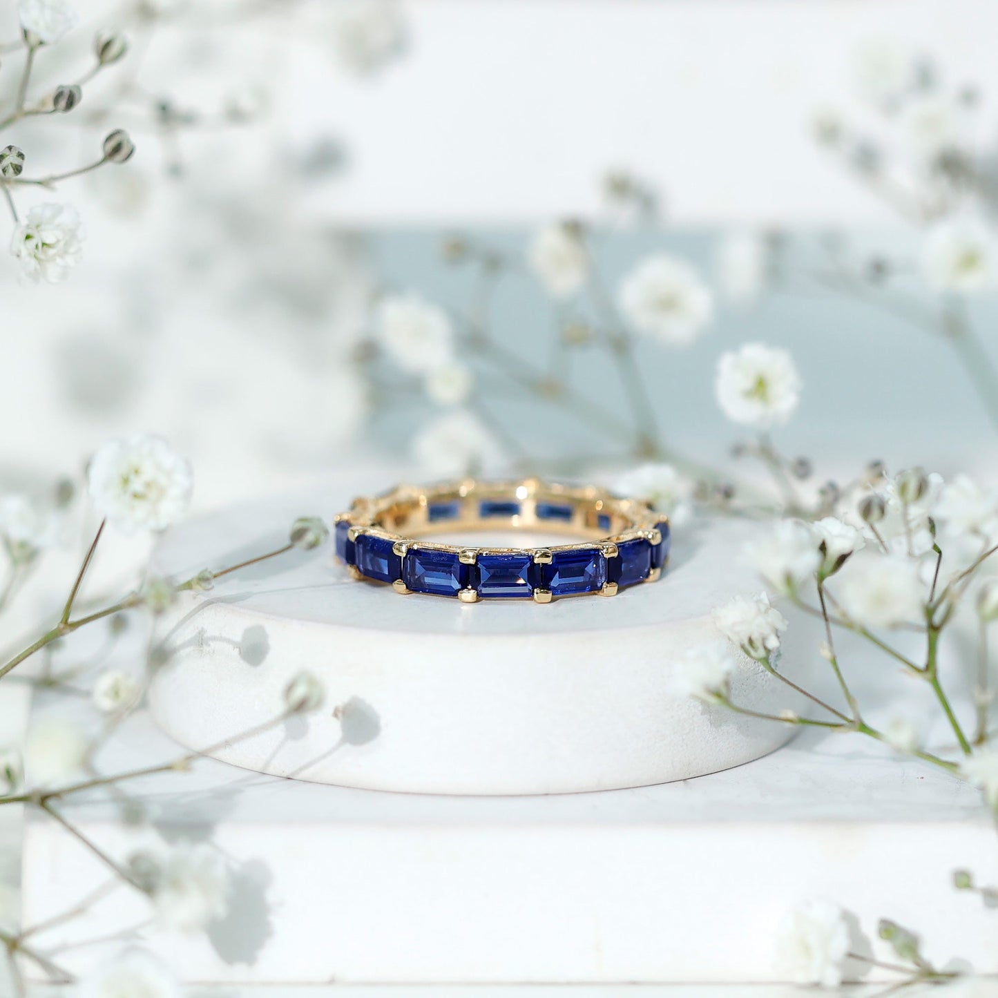 Certified Emerald Cut Lab Grown Blue Sapphire Eternity Band Ring in East West Style