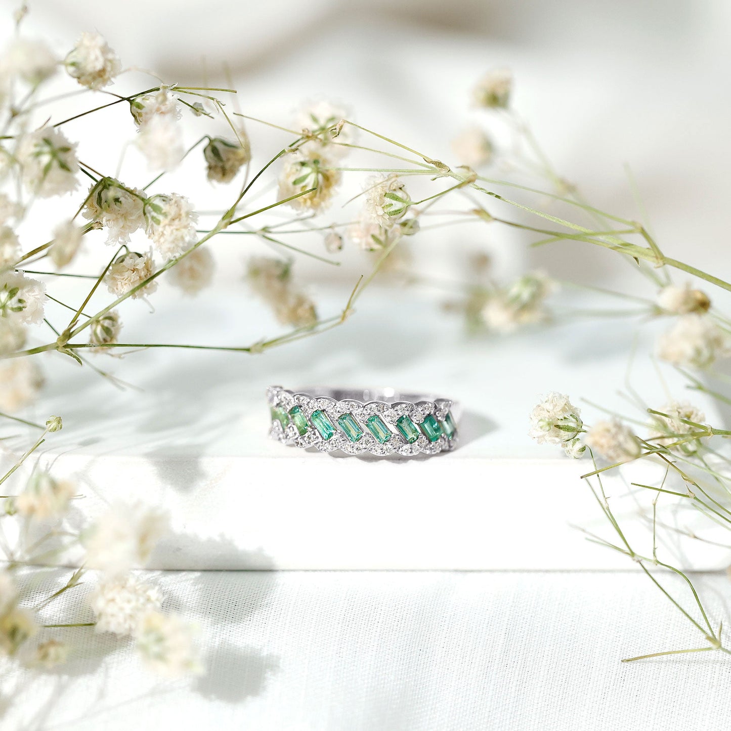 Baguette Emerald and Diamond Braided Half Eternity Band Ring