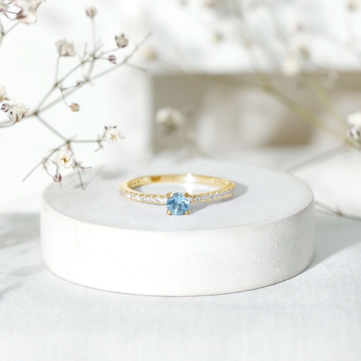 Real Aquamarine Solitaire Ring with Diamond Side Stones