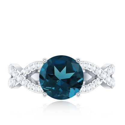 Real London Blue Topaz Crossover Engagement Ring with Diamond
