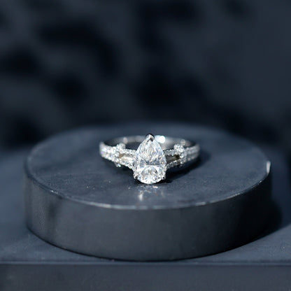 Pear Shaped Moissanite Solitaire Engagement Ring in Split Shank