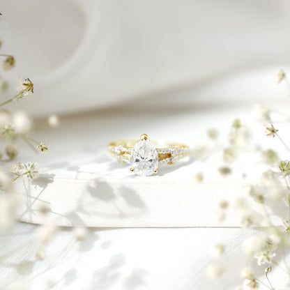 Pear Shaped Moissanite Solitaire Engagement Ring in Split Shank