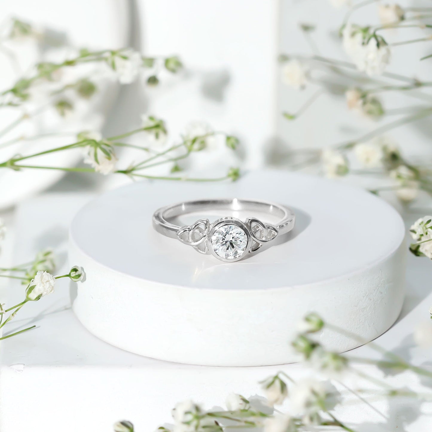 Bezel Set Moissanite Promise Ring with Celtic Knot Details