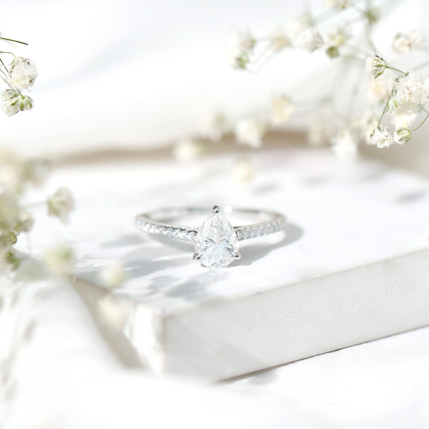 Certified Moissanite Pear Shape Engagement Ring with Side Stones