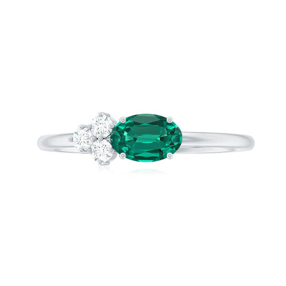 East West Style Oval Lab Grown Emerald Promise Ring with Diamond Trio