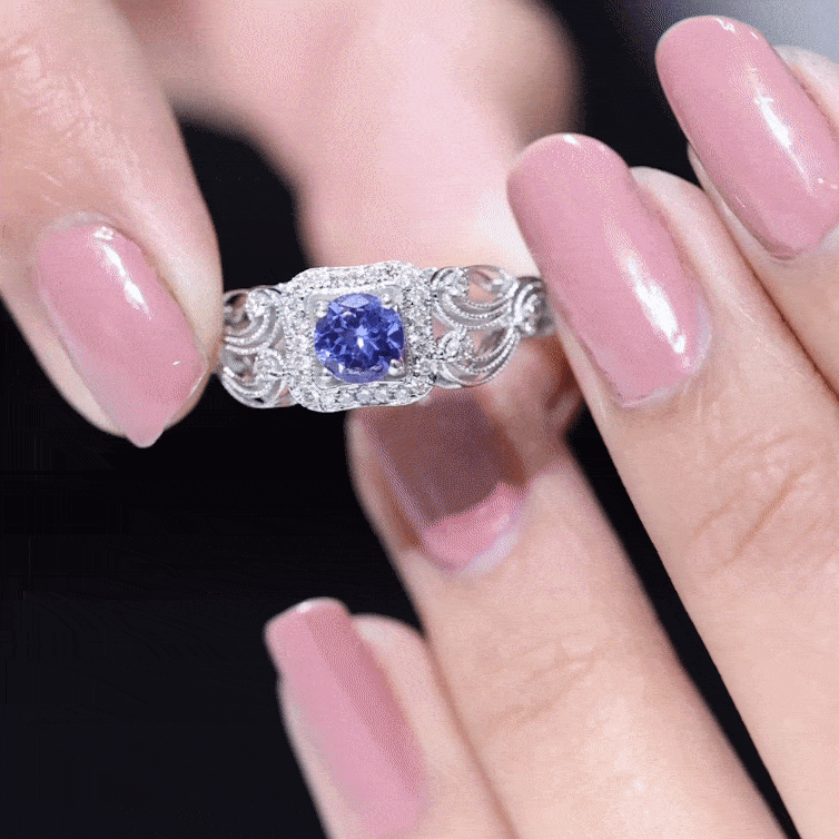 Tanzanite Vintage Looking Engagement Ring with Diamond Halo