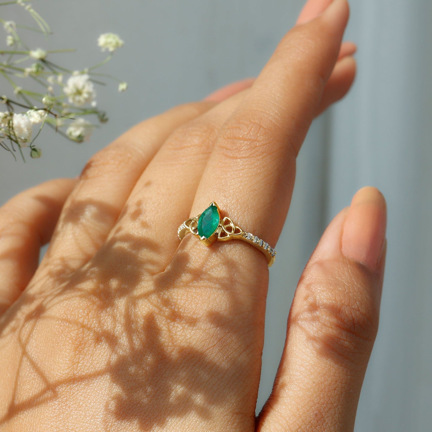 Marquise Cut Emerald Celtic Knot Engagement Ring with Diamonds
