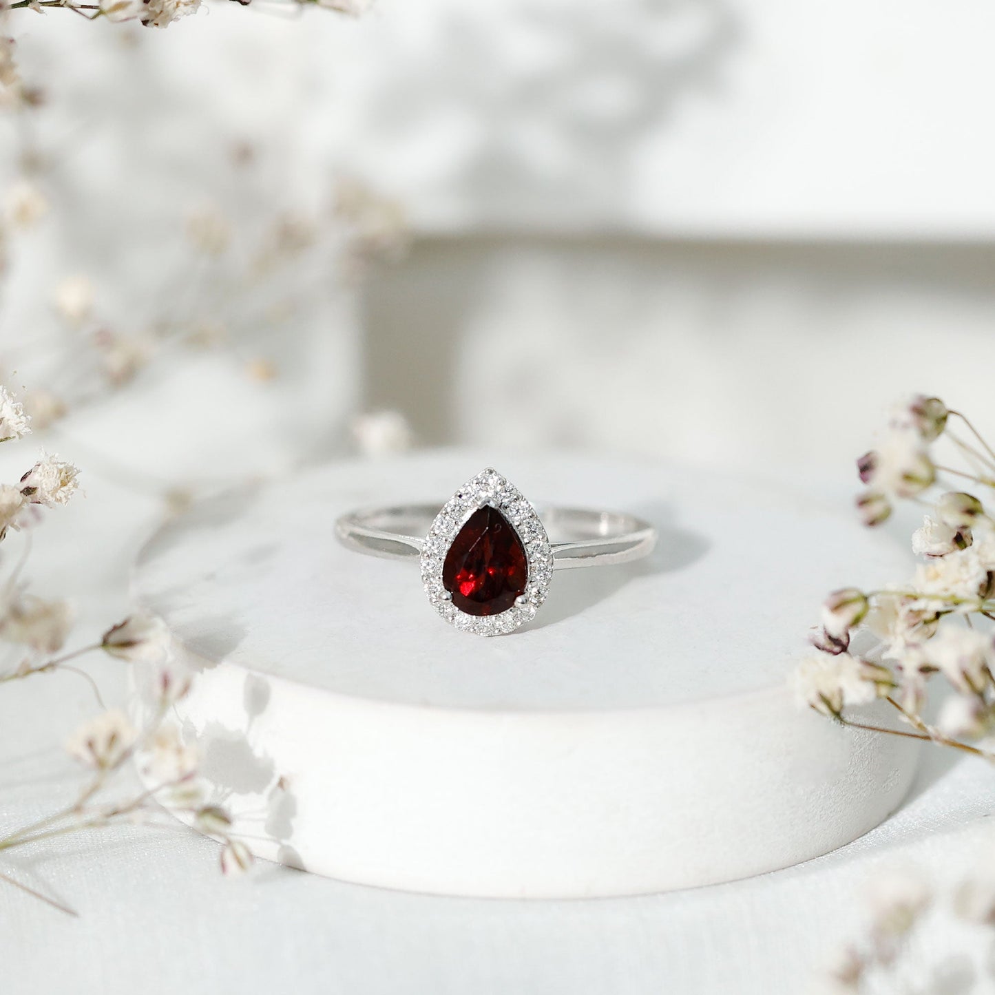 Classic Garnet Teardrop Engagement Ring with Diamond Halo