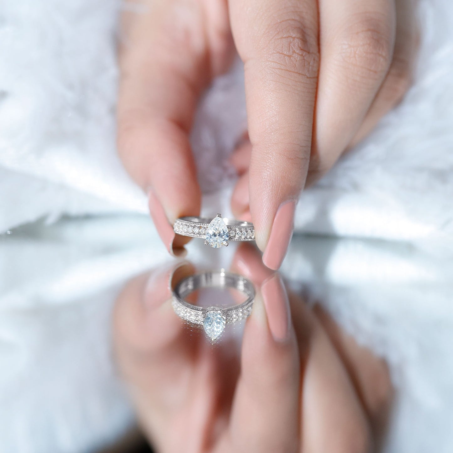 Pear Shaped Moissanite Solitaire Engagement Ring with Beaded Design