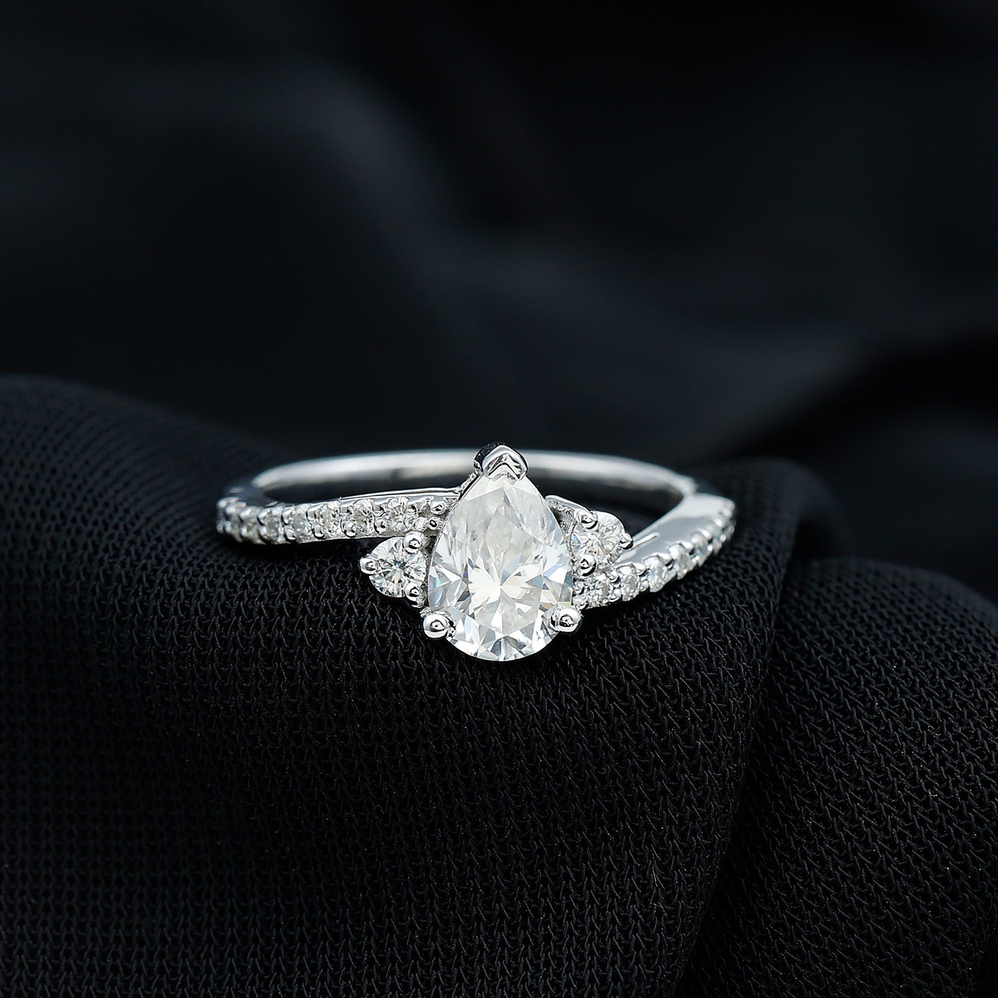 Pear Cut Moissanite Bypass Engagement Ring with Side Stones