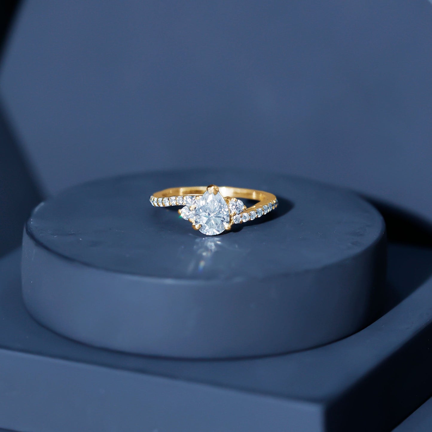 Pear Cut Moissanite Bypass Engagement Ring with Side Stones