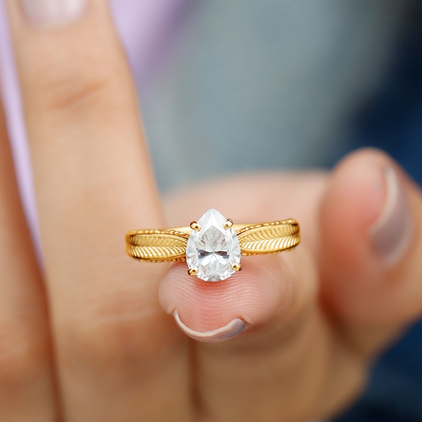 Claw Set Pear Shape Moissanite Engagement Ring