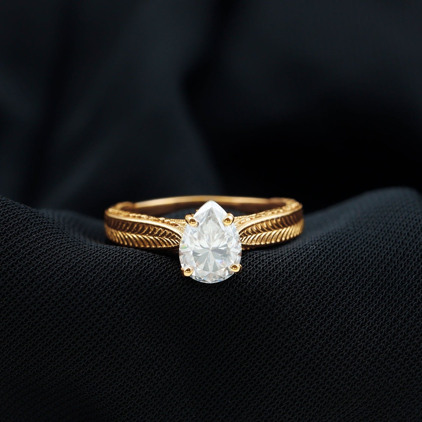 Claw Set Pear Shape Moissanite Engagement Ring