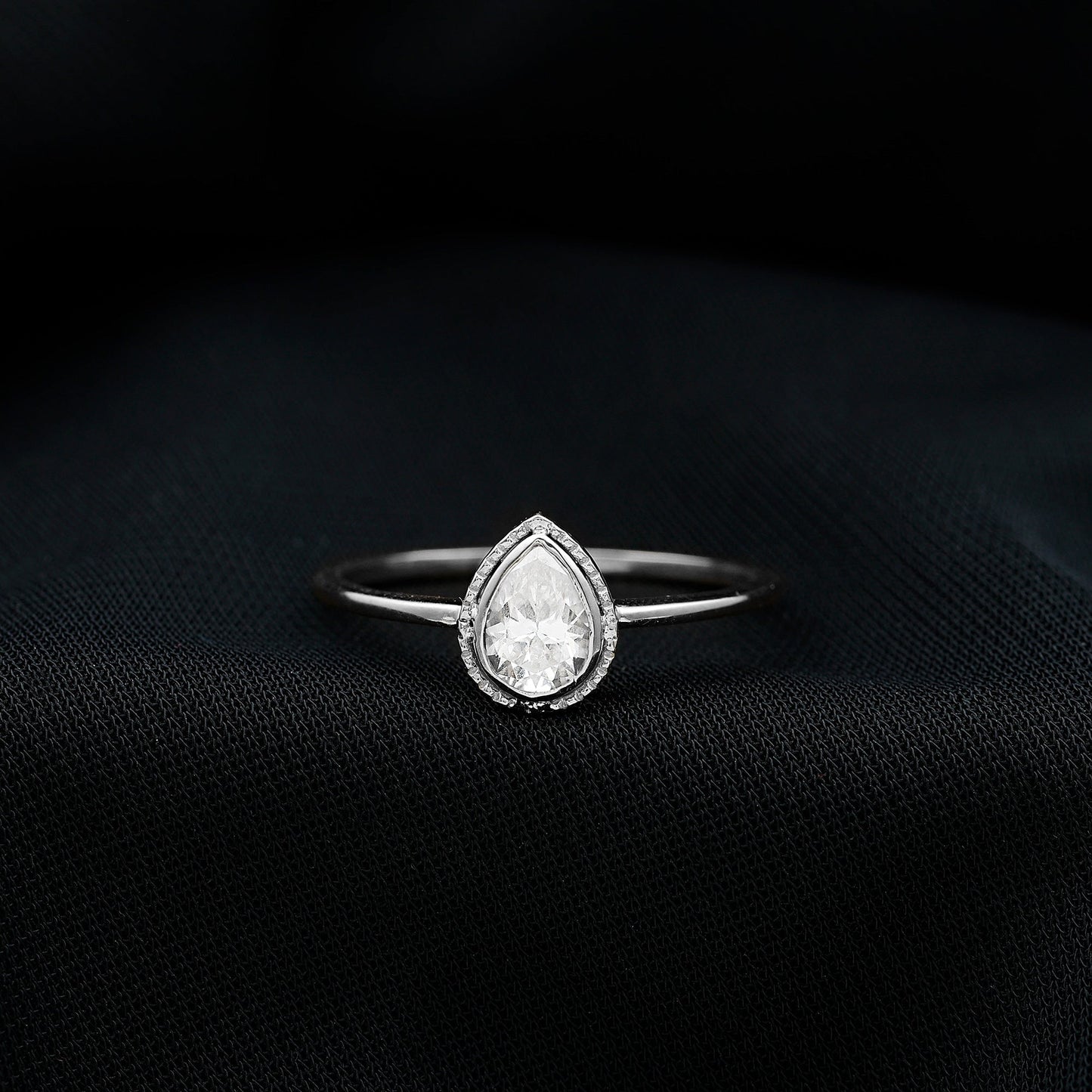 Pear Shaped Moissanite Solitaire Engagement Ring in Bezel Setting