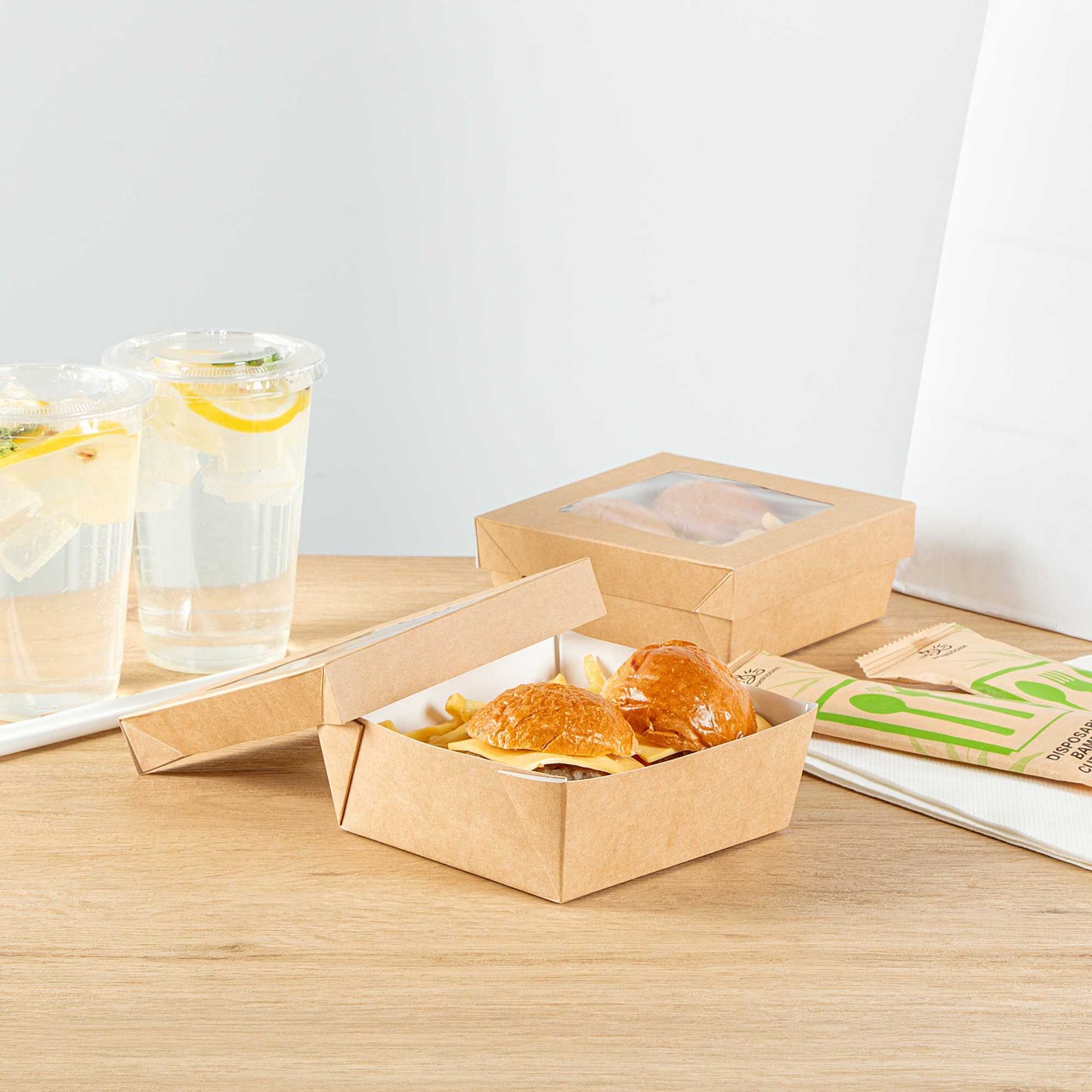 Cafe Vision 27 oz Square Kraft Paper Medium Take Out Container - 5 1/4" x 5 1/4" x 2" - 25 count box