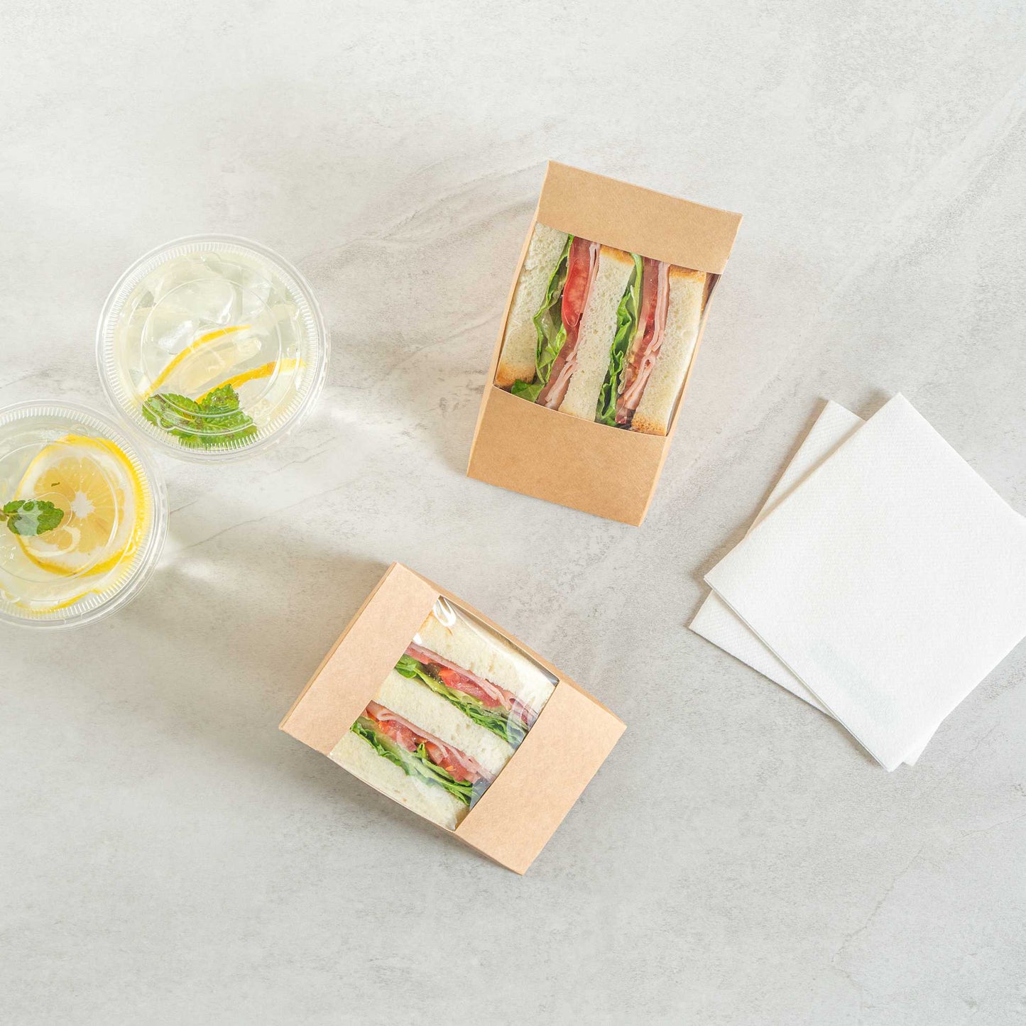 Cafe Vision Triangle Kraft Paper Large Sandwich Box - 4 3/4" x 4 3/4" x 3 1/4" - 25 count box