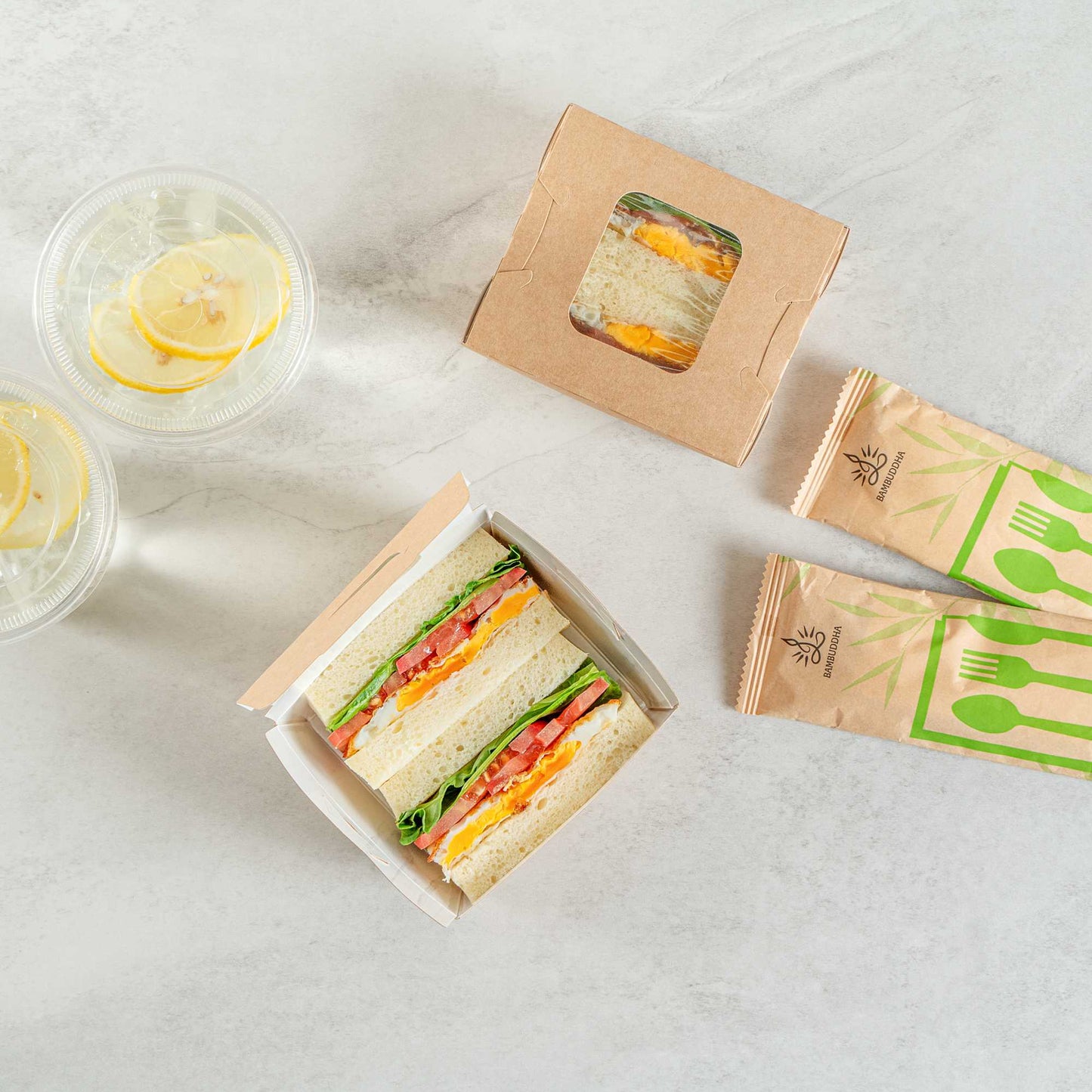 Cafe Vision 12 oz Rectangle Kraft Paper Mini Bio Take Out Container - Two Windows - 4 1/4" x 3 3/4" x 1 3/4" - 50 count box