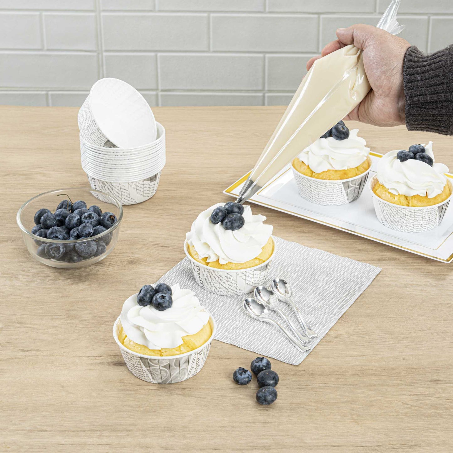 Panificio 5 oz Round Newsprint Paper Large Baking Cup - Pleated - 3 3/4" x 3 3/4" x 1 1/2" - 200 count box