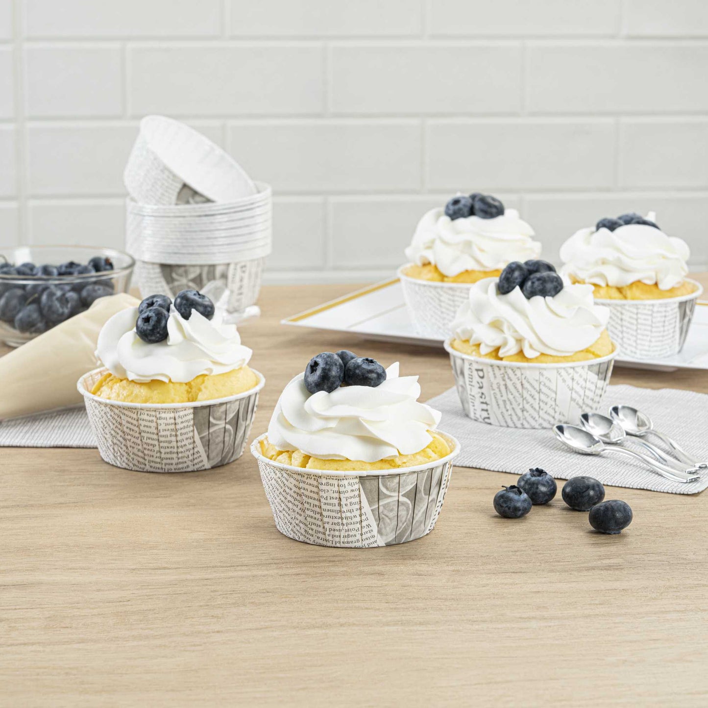 Panificio 5 oz Round Newsprint Paper Large Baking Cup - Pleated - 3 3/4" x 3 3/4" x 1 1/2" - 200 count box
