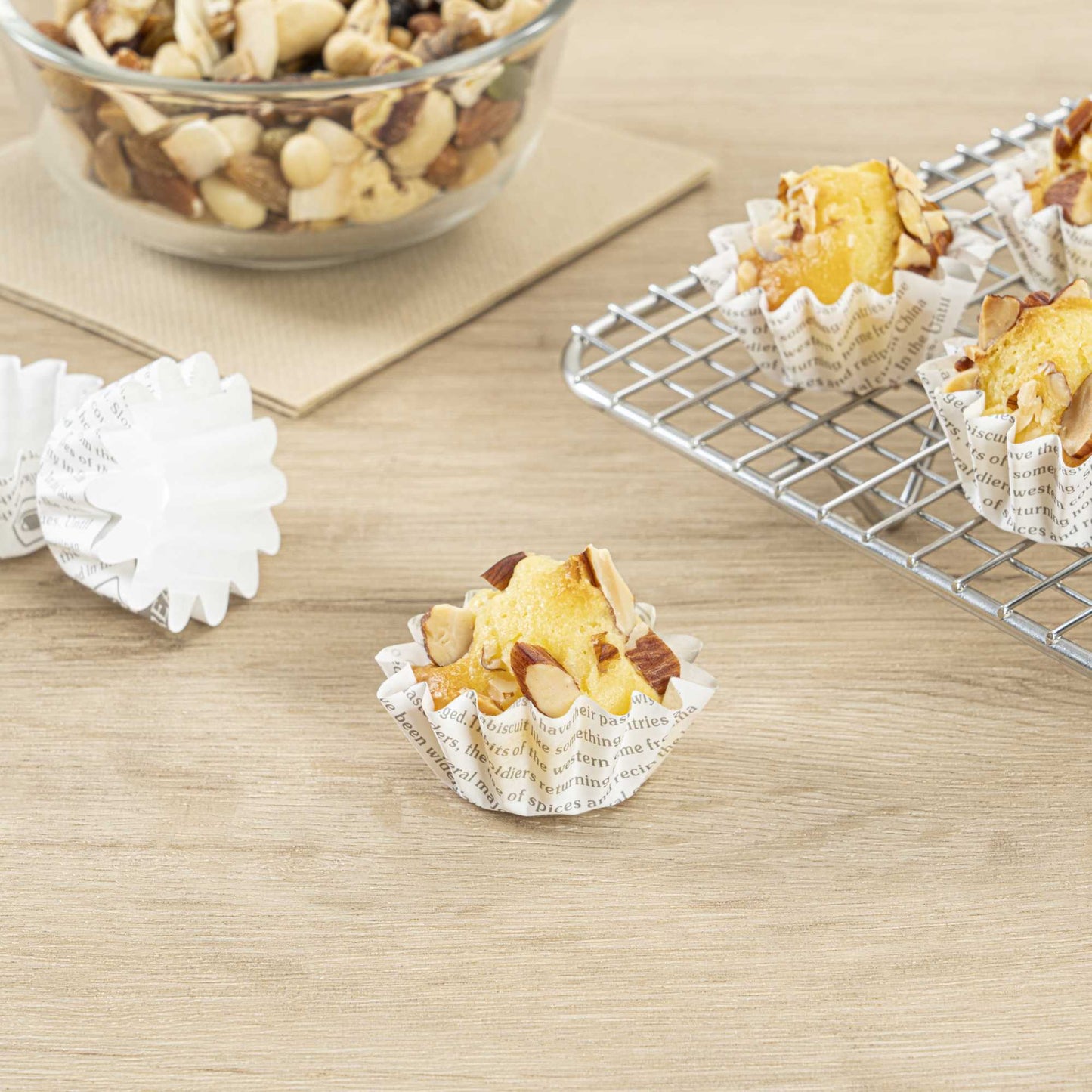 Panificio 0.4 oz Round Newsprint Paper Mini Baking Cup - Flared - 2" x 2" x 1/2" - 200 count box