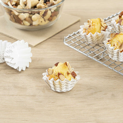 Panificio 0.4 oz Round Newsprint Paper Mini Baking Cup - Flared - 2" x 2" x 1/2" - 200 count box