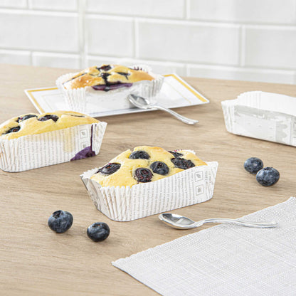 Panificio 5 oz Elliptical Newsprint Paper Large Baking Cup - Ridged - 4 1/2" x 2 1/2" x 1 1/4" - 200 count box