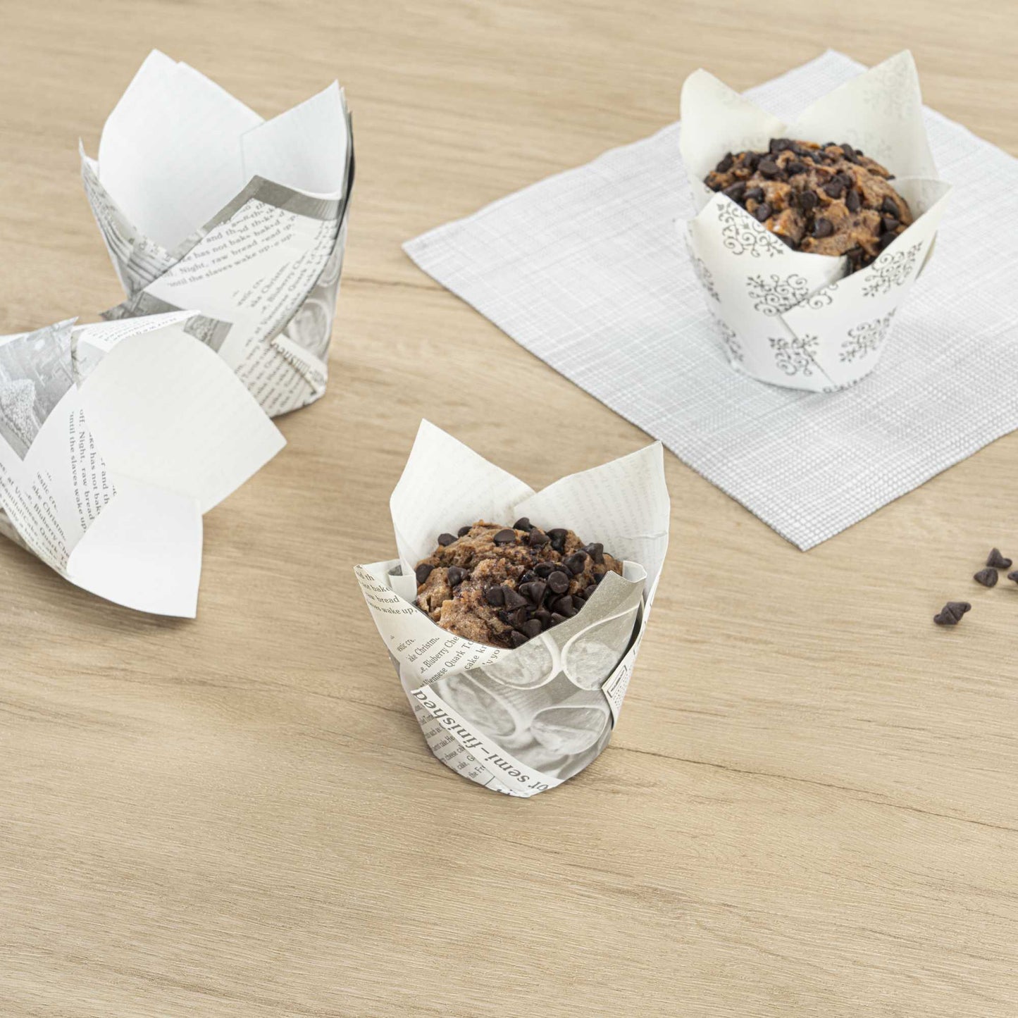 Panificio 3.5 oz Tulip Newsprint Paper Tall Baking Cup - 3 1/4" x 3 1/4" x 3 1/4" - 200 count box