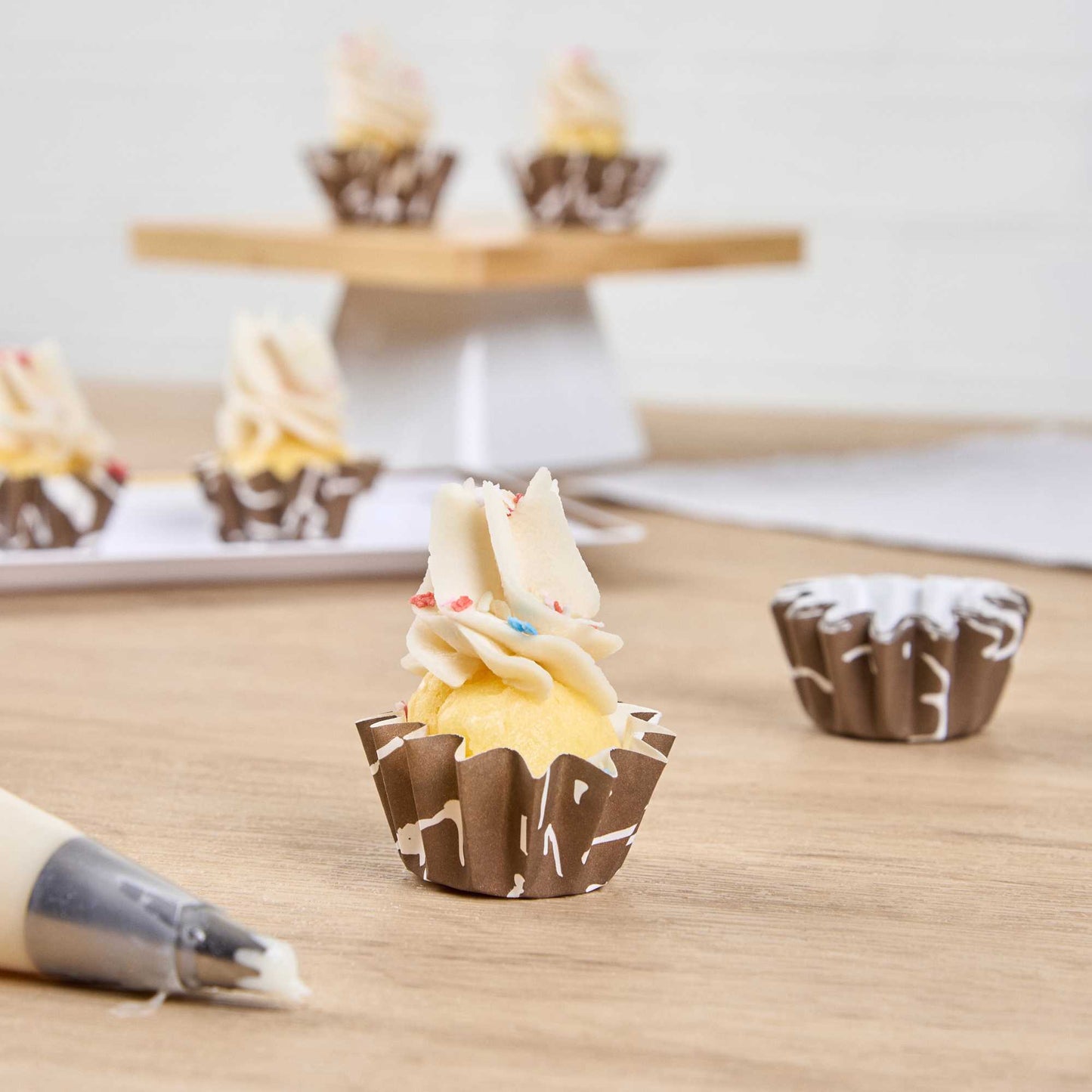 Panificio 0.4 oz Round Chocolate Wisp Paper Mini Baking Cup - Flared - 2" x 2" x 1/2" - 200 count box
