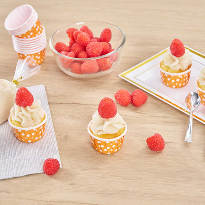 Panificio 1 oz Round Polka-Dotted Hot Orange Paper Small Baking Cup - Pleated - 2" x 2" x 1 1/4" - 200 count box