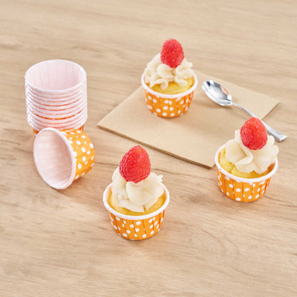 Panificio 1 oz Round Polka-Dotted Hot Orange Paper Small Baking Cup - Pleated - 2" x 2" x 1 1/4" - 200 count box