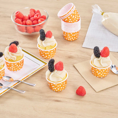 Panificio 2 oz Round Polka-Dotted Hot Orange Paper Medium Baking Cup - Pleated - 2 1/4" x 2 1/4" x 1 1/2" - 200 count box