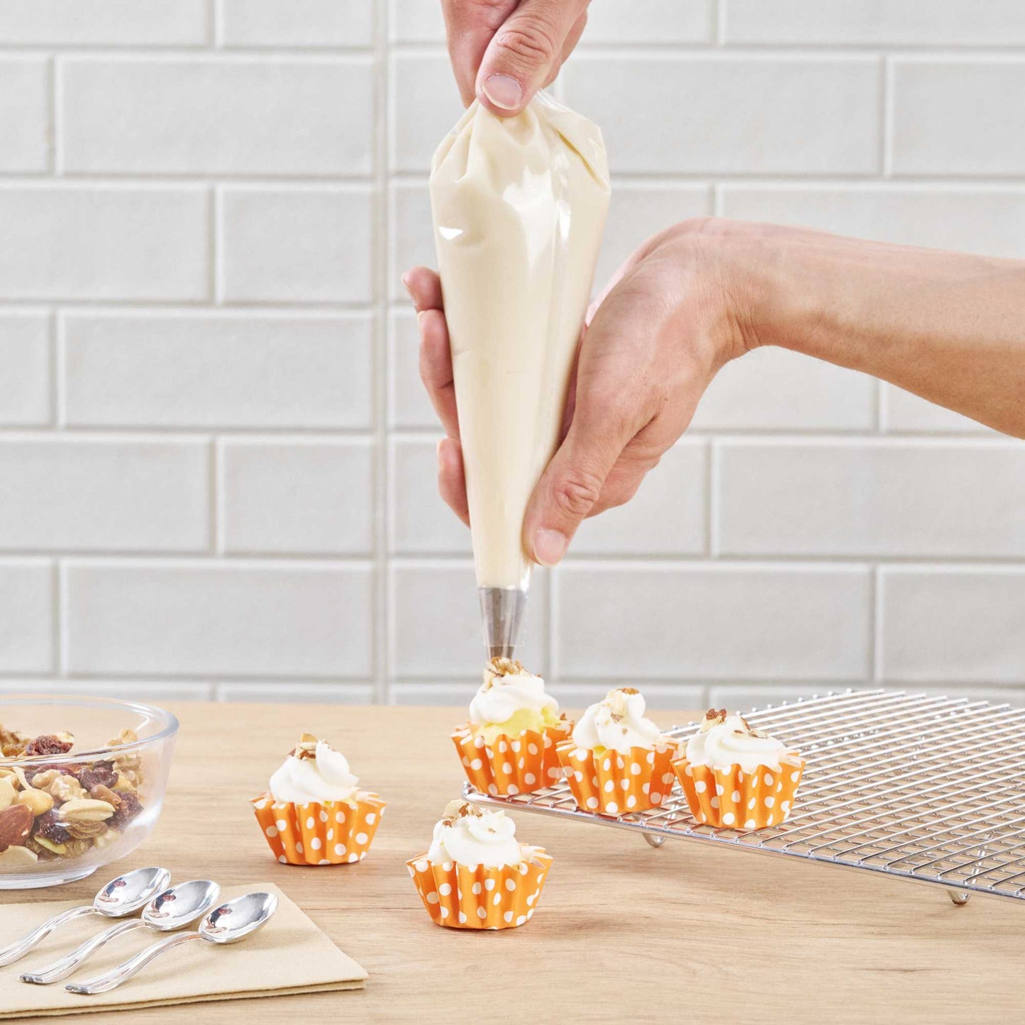 Panificio 0.4 oz Round Polka-Dotted Hot Orange Paper Mini Baking Cup - Flared - 2" x 2" x 1/2" - 200 count box
