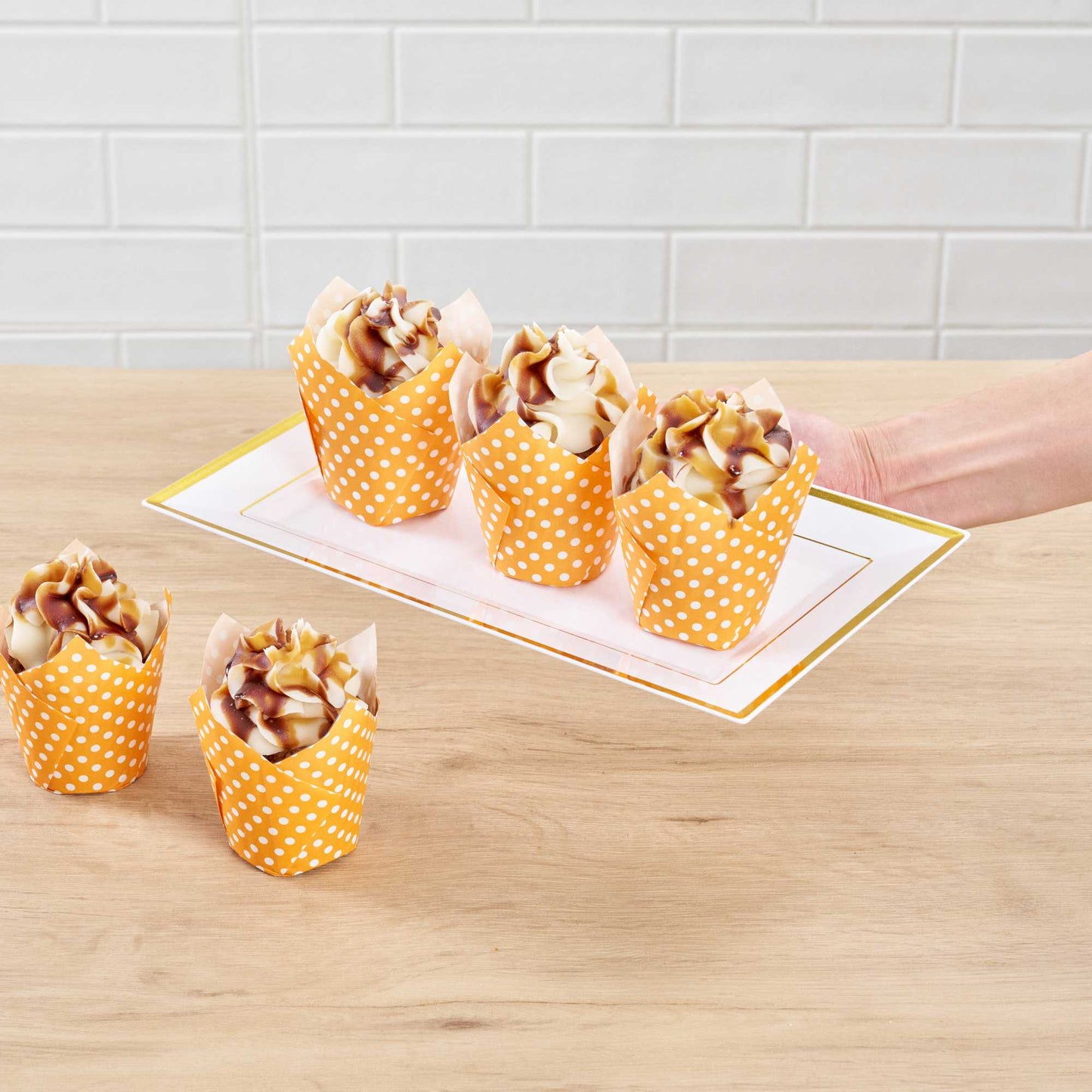 Panificio 2 oz Tulip Polka-Dotted Hot Orange Paper Tall Baking Cup - 3 1/4" x 3 1/4" x 3 1/2" - 200 count box
