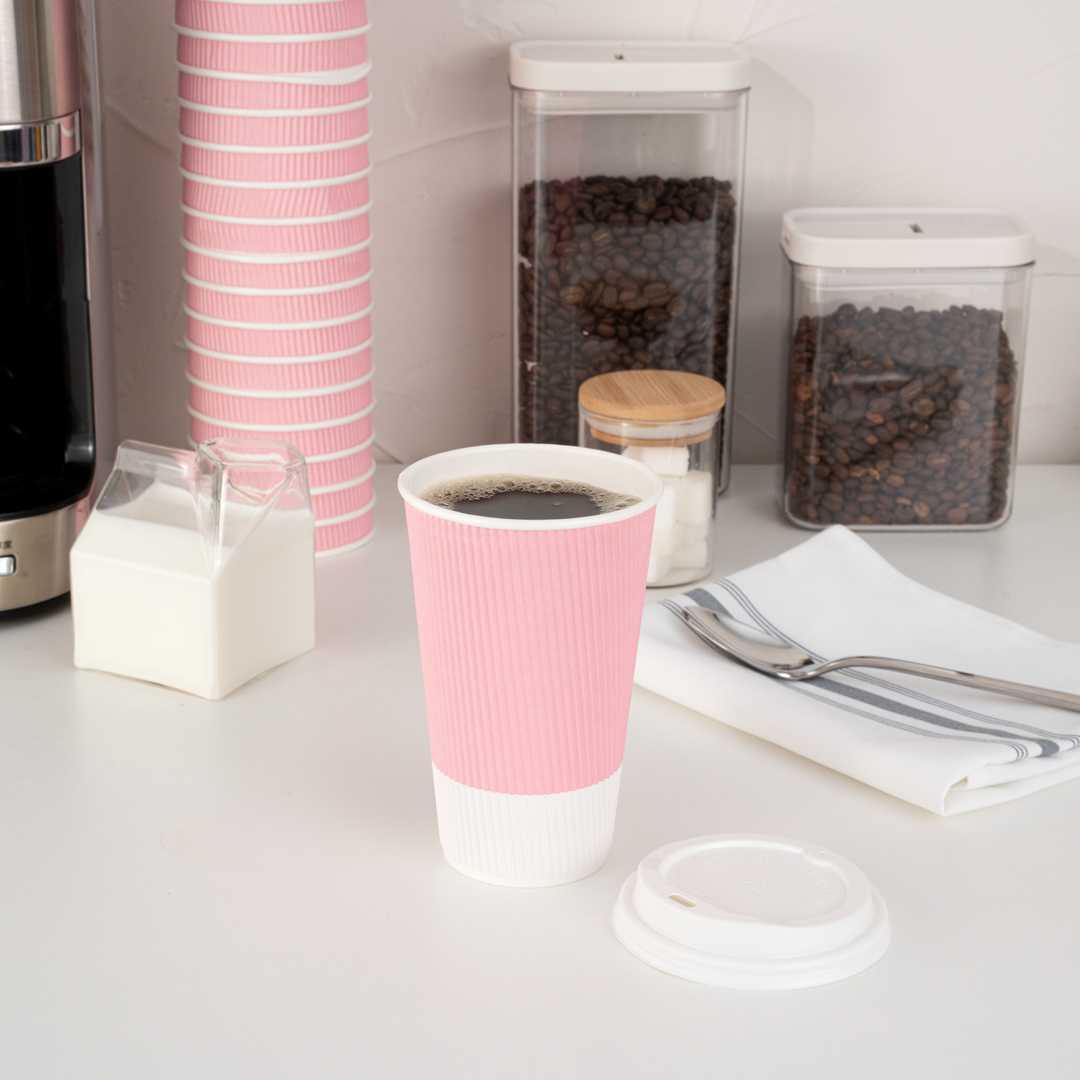 Restpresso 16 oz Light Pink Paper Coffee Cup - Ripple Wall - 3 1/2" x 3 1/2" x 5 1/2" - 25 count box