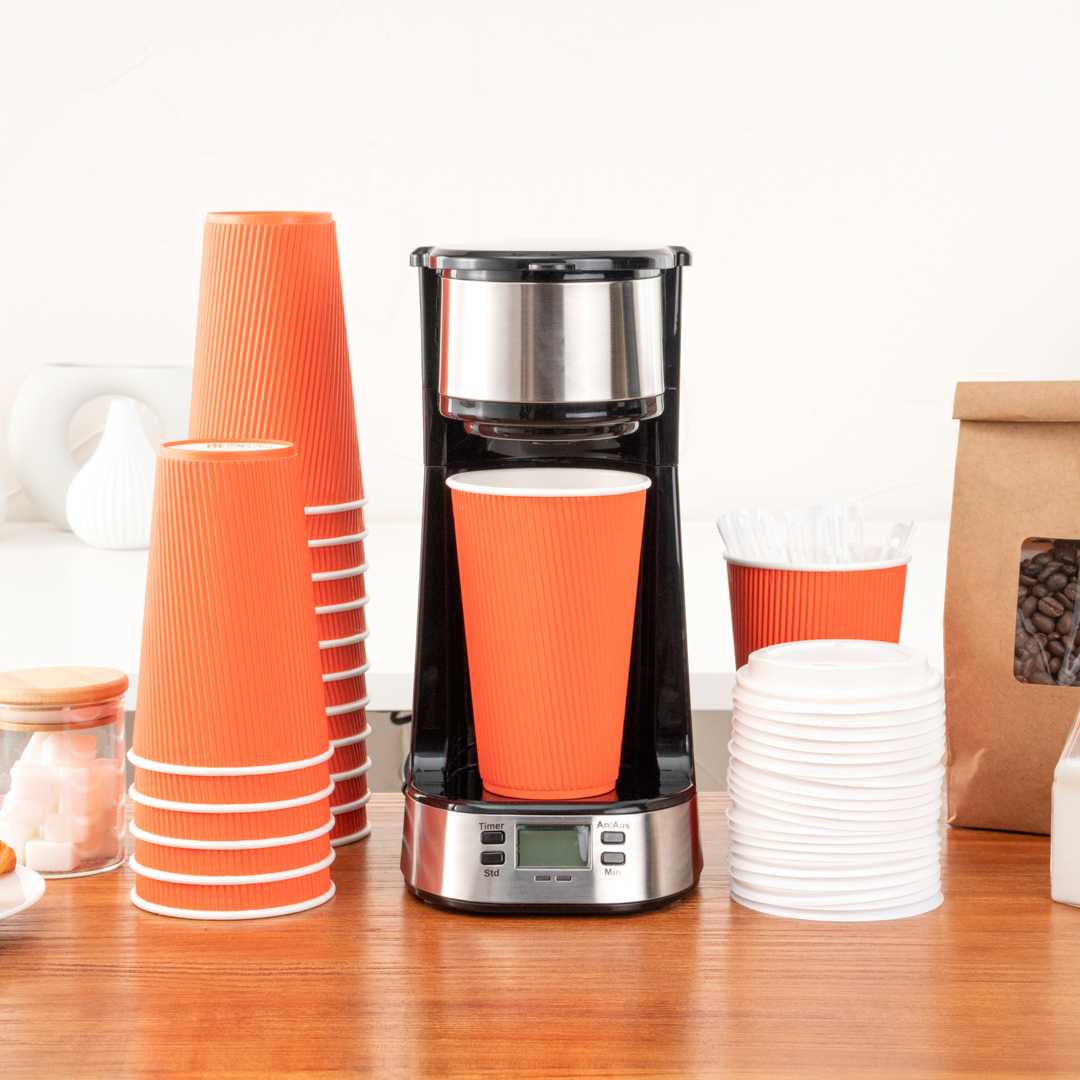 Restpresso 16 oz Tangerine Orange Paper Coffee Cup - Ripple Wall - 3 1/2" x 3 1/2" x 5 1/2" - 500 count box