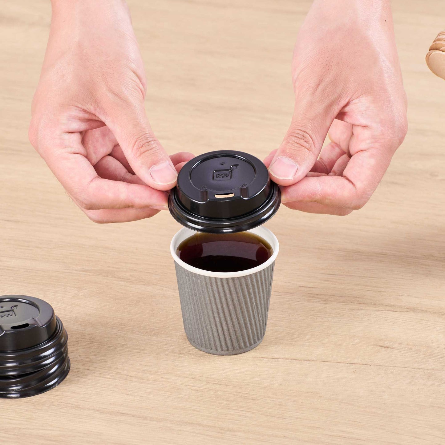 Restpresso Black Plastic Coffee Cup Lid - Fits 4 oz - 2 1/2" x 2 1/2" x 1/2" - 25 count box