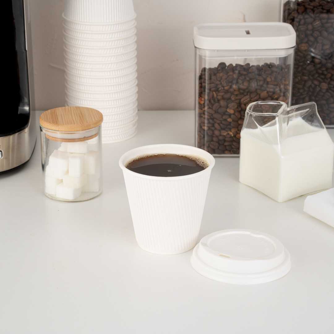Restpresso 8 oz White Paper Coffee Cup - Ripple Wall - 3 1/2" x 3 1/2" x 3 1/4" - 500 count box